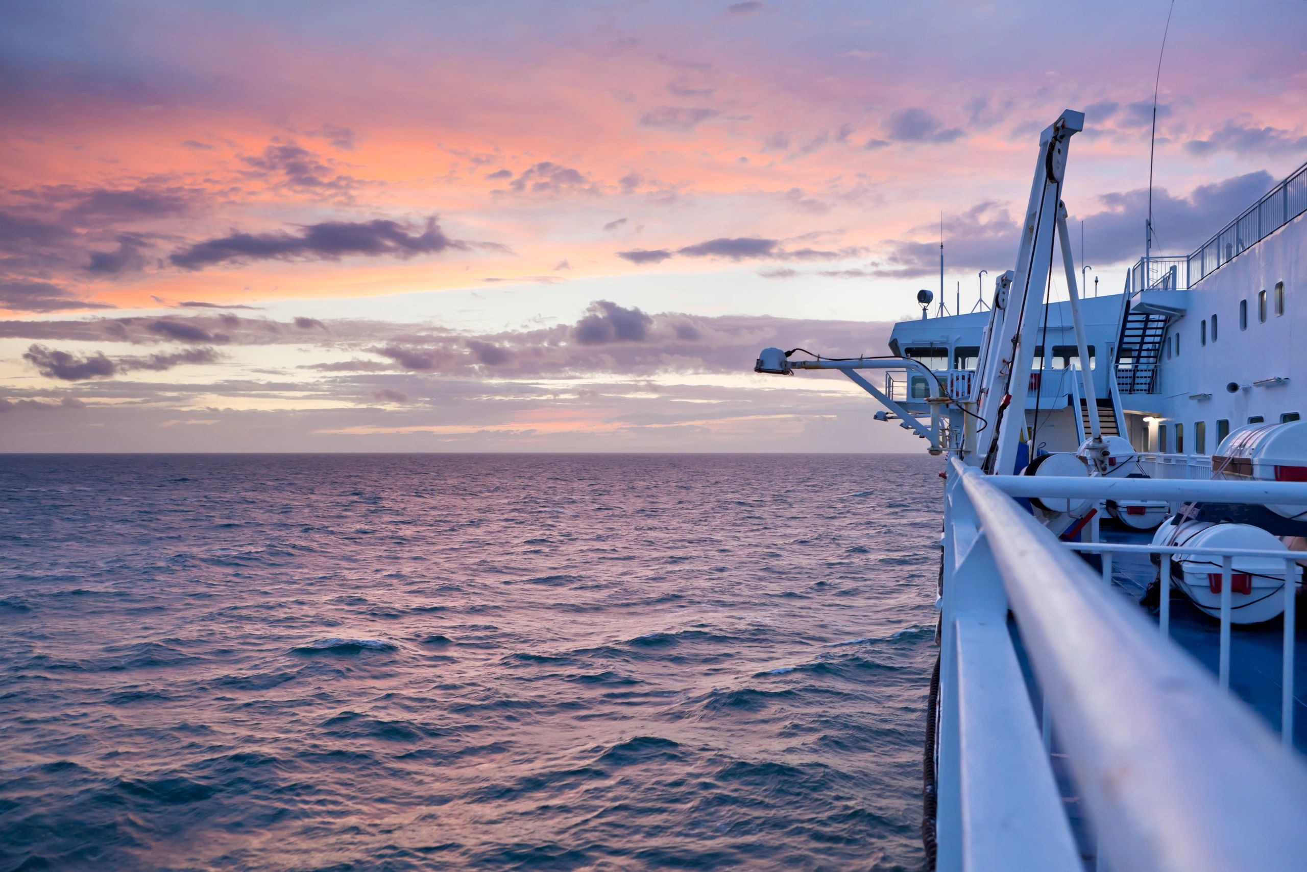 Sunset view over the sea from a passenger ship